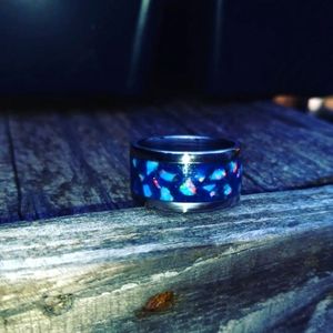 Peacock opal set in serenity blue sand